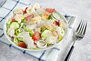 Salad fattoush. Healthy vegetarian food. Traditional Middle Eastern salad with toasted pita bread and vegetables