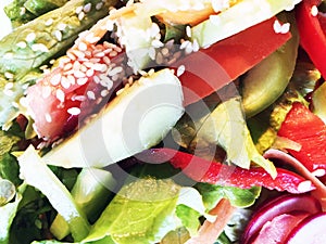 Salad. Fresh summer lettuce salad.Healthy mediterranean salad on wooden table. Vegetarian food