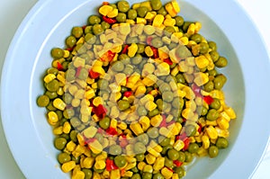 Salad with green peas, corn and red pepper.