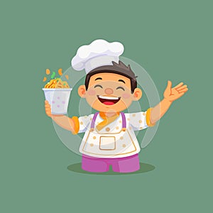 Boy Chef Smiling with Toque and Spoon Ready to Cook