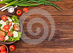 Salad with meat and tomatoes.