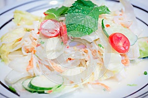 Salad mix with fresh vegetable and crab stick.