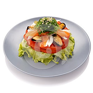 Salad with mussels and salmon on a white background for the site2