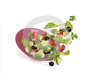 Salad in a pink plate