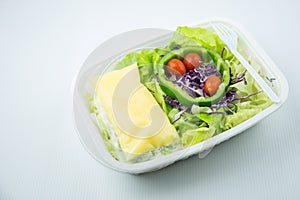 Salad on plastic box