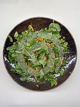 Salad plate with green organic vegetables