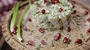 Salad on a plate spinning close-up