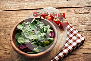 salad plate vegetables fresh ingredients wooden table kitchen