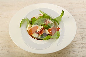 Salad with proscuitto, mozzarella