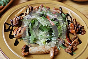 Salad with quid on the table