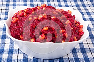 Salad of red beets with maize