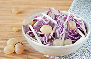 Salad of red cabbage with apples and grapes