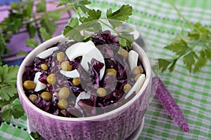 Salad of red cabbage with peas and eggs