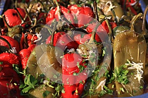 Salad of roasted and peeled whole red and green peppers