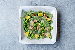 Salad with Rocket Leaves, Orange and Walnuts / Arugula or Rucola.