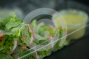 Salad roll vegetables wrapped in clear plastic box