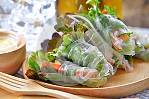 Salad rool healthy food on wood plate