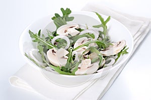 Salad with rucola and mushrooms