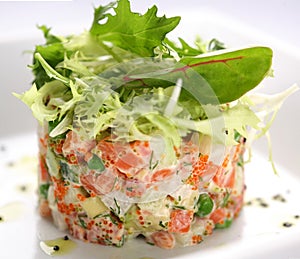 Salad with salmon, caviar and arugula