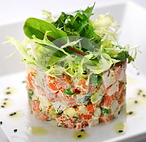 Salad with salmon, caviar and arugula