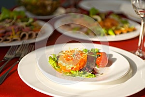 Salad with salmon and tomato