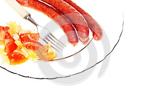 Salad sausage on plate isolated