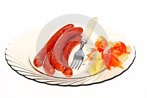 Salad sausage on plate isolated