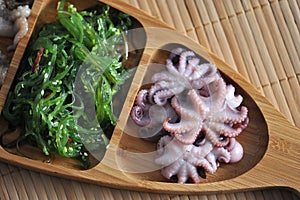 Salad from sea cabbage chuka, octopus