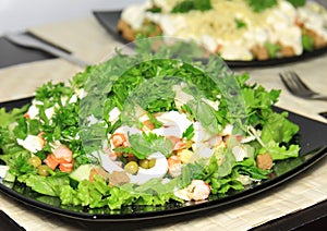 Salad with shrimps, dried crust, leaf of lettuce.