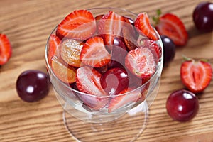 Salad of strawberries and plums.