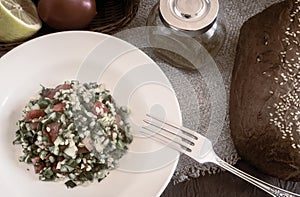 Salad Tabule - a common dish of Arabic cuisine. photo
