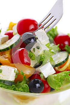 Salad with tomato, cucumber and olives