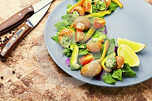 Salad with vegetables and snails