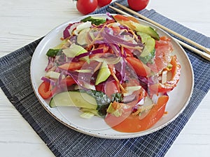 Salad, vegetarian chinese food tomato fresh nutrition health on a wooden background table