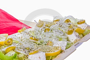 Salad with white cheese olives onion lemon and dill