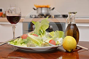 Mix salade tomato oil lemon wine olive photo