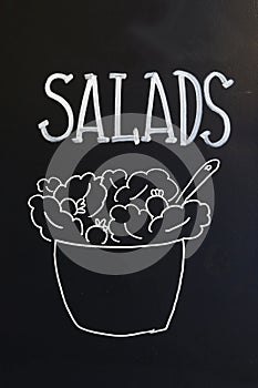 Salads advertized on blackboard in Barcelona, Spain