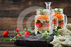 Salads with quinoa, arugula, radish, tomatoes and cucumber