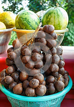 Salak Bali or Snake fruit in plastic basket