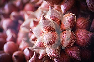 Salak Palm or snake fruit for sale in the fruit market - Salacca zalacca