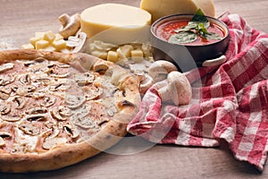 Salami, mushroom and vegetable pizza