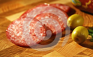 Salami and olives. Tasty slices.
