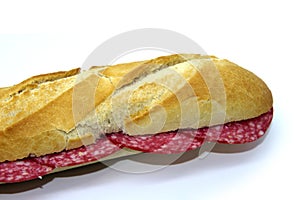 Salami sandwich on baguette, spanish pitufo bread mollete