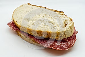 Salami sandwich, panino al salame, isolated on white background