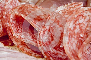 Salami sausage and ham slices