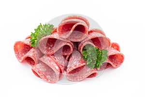 Salami sausage slices isolated on white background.