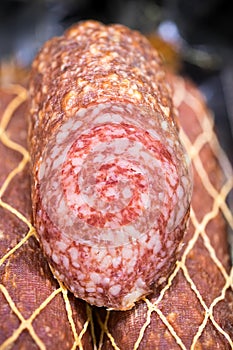 Salami sausages showed at store window