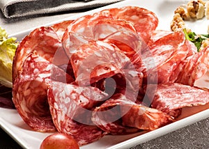 Salami slices on tray in restaurant