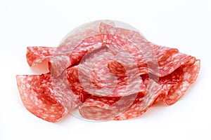 Salami smoked sausage slices on white background cutout