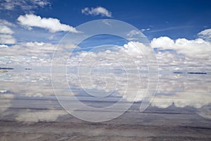 Salar de Uyuni. Perfect sky and clouds reflection on the water of the salt flat